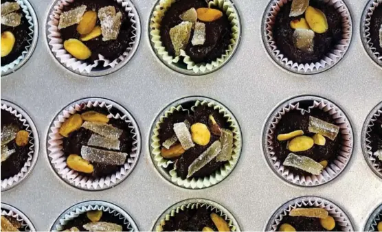  ?? Elizabeth Karmel via AP ?? A recipe of chocolate tahini cups, made with 100 percent cacao chocolate chips, is displayed in Alexandria, Va., on Oct. 18, 2020. There’s more to cacao than chocolate. The cacao fruit and pulp can be used for cooking as well.