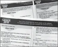  ?? The Associated Press ?? CENSUS CHANGES: Copies of the 2010 Census forms are seen during a news conference in Phoenix to kickoff a national drive as Census forms are mailed to everyone. To keep pace with rapidly changing notions of race, the Census Bureau wants to make broad...