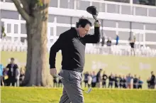  ?? ERIC RISBERG/ASSOCIATED PRESS ?? Phil Mickelson tips his hat on the 18th green of the Pebble Beach Golf Links after winning the AT&amp;T Pebble Beach Pro-Am on Monday. It was Mickelson’s fifth win at Pebble Beach.