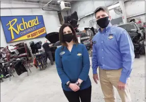  ??  ?? Richard Chevrolet co-owners Jill Silverman, left, and Jason Vianese are photograph­ed in the auto dealer's body shop in Cheshire on Oct. 27.