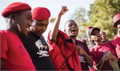  ?? Picture: Jacques Nelles ?? JUSTICE. Bonginkosi Khanyile, raising his fist, with members of the Econpmic Freedom Fighters Student Command at the Union Buildings in Pretoria yesterday.