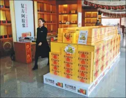  ??  ?? Cartons of ejiao are stacked at a TCM retail outlet.