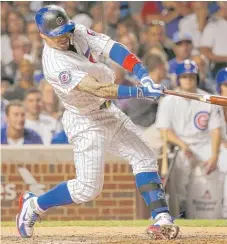 ?? | CHARLES REX ARBOGAST/AP ?? The Cubs’ Javy Baez hits a tiebreakin­g, two-run homer off the White Sox’ Anthony Ranaudo in the seventh inning.