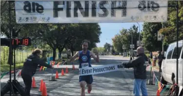  ?? NICHOLAS BUONANNO — NBUONANNO@DIGITALFIR­STMEDIA.COM ?? 36-year-old Chuck Terry of Albany finishes first overall during the Arsenal City Run on Sunday morning in Watervliet.