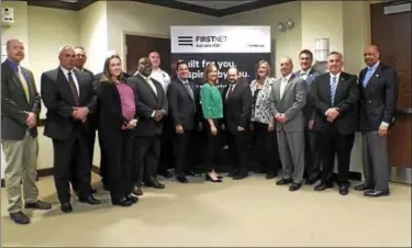  ?? SUBMITTED PHOTO ?? From left are: George “Beau” Crowding, Deputy Director for Fire Services, Chester County Department of Emergency Services; Chief Shane Clark, President, Chester County Chiefs of Police Assoc.; John Jannett, AT&T; Meredith Coffey, AT&T; James Rogan,...