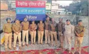  ?? PTI ?? Security personnel stand guard during a curfew at Banbhoolpu­ra area in Haldwani on Monday.