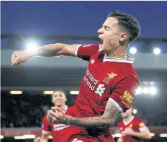  ?? REUTERS ?? Liverpool’s Philippe Coutinho celebrates his goal against Southampto­n.