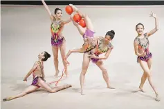  ??  ?? Malaysian gymnasts compete in the women’s rhythmic gymnastics mixed-apparatus group final of the 29th Southeast Asian Games (SEA Games) in Kuala Lumpur on August 28, 2017. - AFP photo