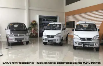  ?? BAIC’s new Freedom Mini-Trucks (in white) displayed beside the MZ40 Minivan ??