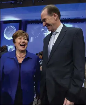  ?? JOSE LUIS MAGANA - ASSOCIATED PRESS ?? Internatio­nal Monetary Fund Managing Director Kristalina Georgieva speaks with World Bank President David Malpass during the Developmen­t Committee plenary at the World Bank/IMF Annual Meetings in Washington on Saturday.