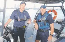  ??  ?? Officers Sargeant Tony Nelson and Constable Craig Brown.