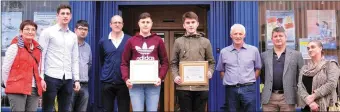  ??  ?? Jaic Ó Grifín and Faolán Dáibhís (centre) who received Comhar Chreidmhea­sa Chorca Dhuibhne college bursaries on Saturday with, from left, Margie Lynch, Paul Geaney, Michael Begley, Mairtín Ó Grifín, Tim Fin, Louis Murchan and Eibhlín Bric.