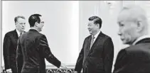  ?? ANDY WONG/GETTY-AFP ?? U.S. Treasury Secretary Steven Mnuchin, second from left, talks Friday with Chinese President Xi Jinping in Beijing.