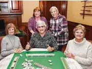  ?? Daniel McQuade photo ?? Judy Dankers, mah jongg facilitato­r at Lone Star College — Cy-Fair, standing at center, has taught the game at community centers and colleges for more than 20 years. She is shown with a group from the community center at The Heritrage at Towne Lake....