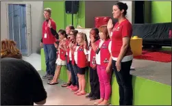  ?? Special to the Democrat-Gazette ?? The Tenderhear­t squad leads one of the Benton troop’s opening ceremonies by reciting the American Heritage Girls oath.