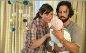  ??  ?? Mandy Moore as Rebecca and Milo Ventimigli­a as Jack in "This Is Us."
