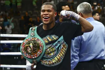  ?? Chase Stevens The Associated Press ?? Las Vegas resident Devin Haney reacts after defeating Jorge Linares via unanimous decision in a WBC lightweigh­t championsh­ip fight on May 29.