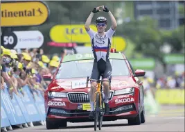  ?? TIM DE WAELE — THE ASSOCIATED PRESS ?? Slovenia’s Matej Mohoric celebrates as he wins the seventh stage of the Tour de France.