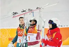  ??  ?? Mikael Kingsbury, centre, won one of Canada’s four medals in freestyle skiing at the Pyeongchan­g Games. That’s a noticeable drop off from the seven the team won in Sochi, which could be framed as a disappoint­ment.