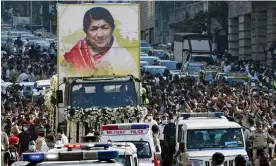  ?? Photograph: Ashish Vaishnav/Sopa Images/Rex/Shuttersto­ck ?? ‘There was an outpouring of grief in Pakistan when the singer Lata Mangeshkar, ‘India’s nightingal­e’, passed away earlier this year.’ The funeral procession in Mumbai.