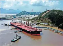  ?? YAO FENG / FOR CHINA DAILY ?? A tanker docks at an oil terminal in Zhoushan Port, Zhejiang province.