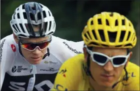  ?? PETER DEJONG — THE ASSOCIATED PRESS ?? Britain’s Geraint Thomas, wearing the overall leader’s yellow jersey, and Britain’s Chris Froome, ride during the fourteenth stage of the Tour de France cycling race over 188 kilometers (116.8 miles) with start in Saint-Paul Trois-Chateaux and Mende,...