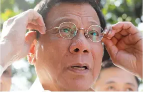  ??  ?? Philippine President Rodrigo Duterte speaks to reporters in Manila on Friday. (Reuters)
