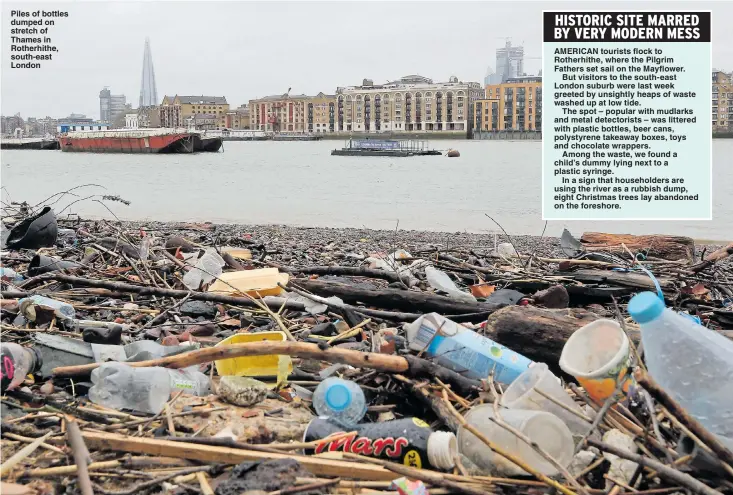  ??  ?? Piles of bottles dumped on stretch of Thames in Rotherhith­e, south-east London