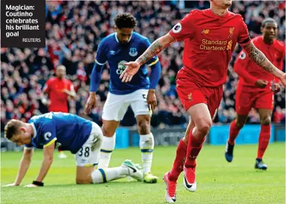  ?? REUTERS ?? Magician: Coutinho celebrates his brilliant goal