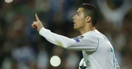  ?? PAUL WHITE/THE ASSOCIATED PRESS ?? Real Madrid’s Cristiano Ronaldo celebrates after scoring a penalty during a Group H Champions League match against Tottenham.