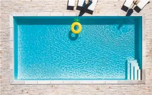  ?? GETTY IMAGES ?? Swimply will help you rent your pool or yard to people wanting to take a dip on a hot summer day.