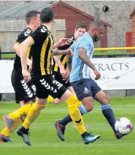  ??  ?? Clean through James Marks powers forward on a rare Arthurlie attack