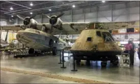  ??  ?? The Apollo 11capsule sits in the restoratio­n hanger at the National Air and Space Museum’s Steven F. Udvar-Hazy Center in Chantilly, Va.