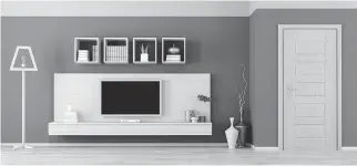  ??  ?? An LED TV can fit into a minimalist living room. The cabinet has a backdrop for the TV, which matches the rest of the decor. Another option is to fill one wall with built-in bookcases, leaving space at the centre to hang a TV, says Caleb Anderson,...