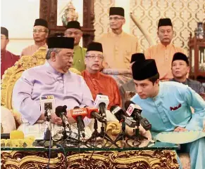  ??  ?? New era: Tengku Abdul Rahman (left) with his brother Tengku Abdul Fahd Muadzam Sultan Ahmad Shah after the press conference at Istana Abu Bakar in Pekan.