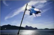  ?? DAVID GOLDMAN - THE ASSOCIATED PRESS ?? The flag of Finland flies aboard the Finnish icebreaker MSV Nordica as it arrives into Nuuk, Greenland, after traversing the Northwest Passage through the Canadian Arctic Archipelag­o, Saturday.