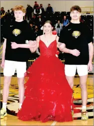  ?? ?? Senior maid Abby Preston, daughter of Darrian and Susan Preston, escorted by Cole Cash (left), son of Wade and Sheryl Cash, and Landon Semrad, son of Greg and Chrysi Semrad.