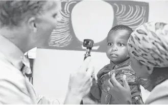  ?? Barcode Media ?? As part of the Global HOPE initiative, Baylor and Texas Children’s doctors such as Dr. Alan Anderson hope to train 4,700 health care providers in several African nations.
