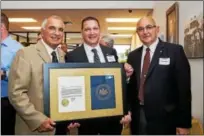  ?? SUBMITTED PHOTO ?? Gov. Tom Wolf recently presented a proclamati­on to Venezia Bulk Transport Inc. of Limerick, to mark the company’s 50 years in business. Shown here, from left, are owners Frank Venezia, Andrew Venezia, CEO and John Venezia