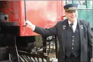  ?? LISA MITCHELL - MEDIANEWS GROUP ?? Kutztown Mayor Jim Schlegel, train conductor, announces, “All aboard!”