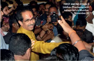  ??  ?? FIRST AMONG EQUALS Uddhav Thackeray with supporters in Mumbai, November 26 MANDAR DEODHAR