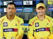  ??  ?? A file photo of M.S. Dhoni and Michael Hussey.