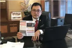  ??  ?? Chong shows a brochure listing the tariffs charged by MRM Berhad for public performanc­e of music works in Malaysia.