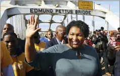  ??  ?? Former candidate for Georgia governor Stacey Abrams crosses the Edmund Pettus Bridge.