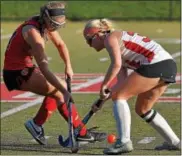  ?? BOB RAINES — DIGITAL FIRST MEDIA ?? Upper Dublin’s Alex Thompson checks Germantown Academy’s Maddie O’Hara.