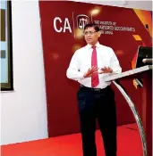  ??  ?? CA Sri Lanka President Jagath Perera officially launching the Institute’s e-library which can be accessed by Chartered accountant­s, non-finance profession­als as well as students