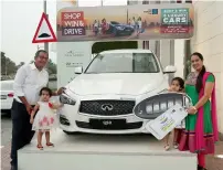  ??  ?? Piyush Agrawal and family with the car they won as part of Dubai Summer Surprises’ Shop, Win and Drive raffle draw.