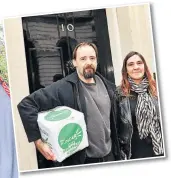  ??  ?? PETITION Couple deliver 18,000 signatures to 10 Downing Street