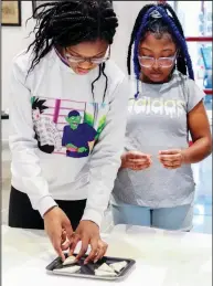  ?? ?? (BELOW, LEFT) CREATE Lab participan­ts make pastries during the fall 2022 series of CREATE Lab.