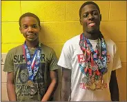  ?? Contribute­d photo ?? On the run: Parkers Chapel's Darnarius Aaron, left, and El Dorado's Deandra Burns will compete in the AAU Jr. Olympic Track & FIeld Championsh­ips in Greensboro, N.C.